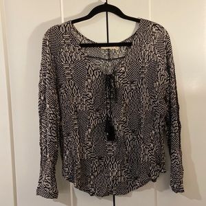 Lush black and white flowy blouse